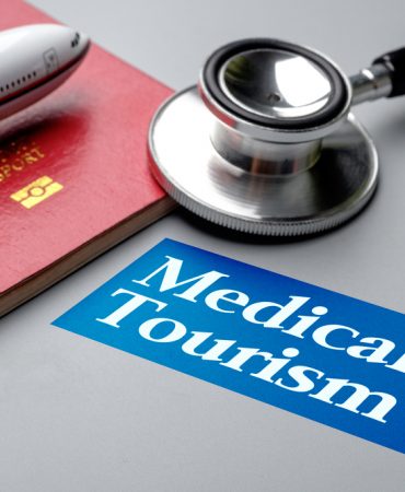 Medical,Tourism,,Medical,Travel,Concept.,Stethoscope,,Toy,Plane,And,Passport